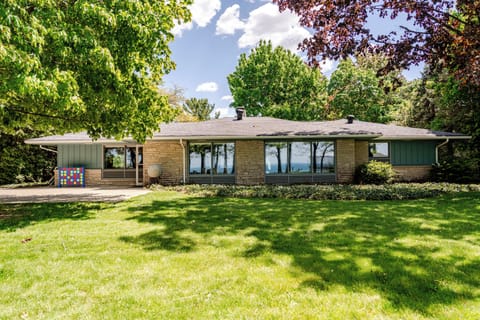 Backyard view and patio. Huge windows to view the Lake.