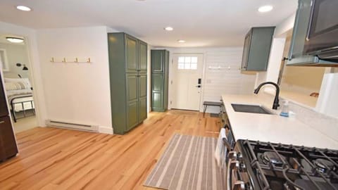 Plenty of storage & beautiful wood floors in the kitchen & living room