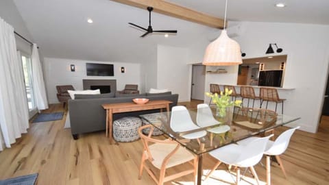 Spread out in the open living and dining area with vaulted ceilings & fireplace