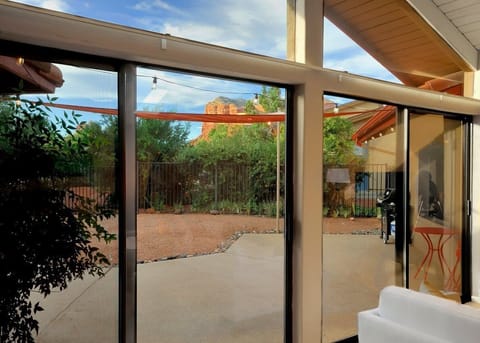 Check out these wall to ceiling windows with views of Capitol Butte