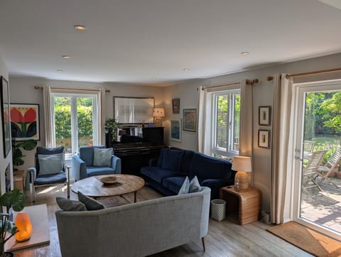 With four huge newly installed double glazed Danish windows, light floods into the sitting room all day and ensures a peaceful and warm setting for our guests.