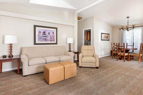 Sink into the sofa while dinner conversations start nearby.