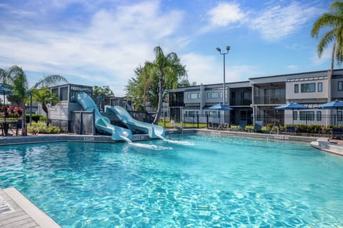Splash into fun with the pool slide and clear water.