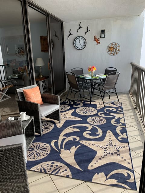 Enjoy the sights and sounds of the ocean on your spacious balcony 🌊