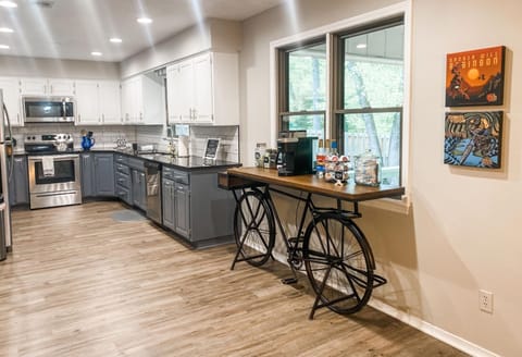 KITCHEN: Fully stocked with quality dishware and your coffee needs.