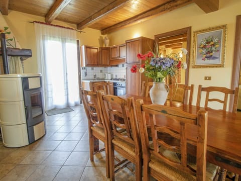 Furniture, Property, Flower, Flowerpot, Houseplant, Plant, Picture Frame, Wood, Cabinetry, Chair