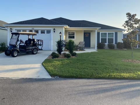 Your Home away from Home with 4-Seat Gas Golf Cart Included
