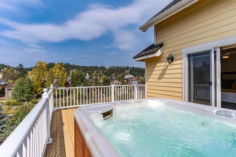 Primary Bedroom Patio w/ Hot tub and View of River: Holy Cow Downtown Riverfront