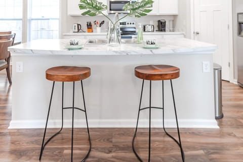 Pull up a stool at the kitchen island and keep the chef company!