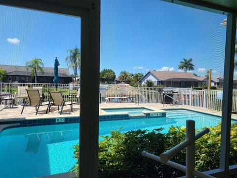 Pool area right outside of your screened in porch.
