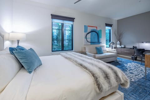 King bed, sleeper sofa, and TV.