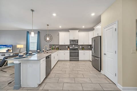 View of kitchen and cooking area