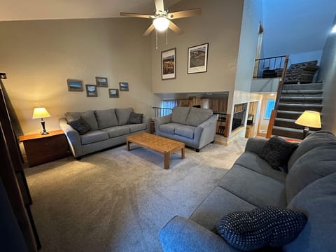 Lovely open space living room. Brand new carpet and brand new furniture.