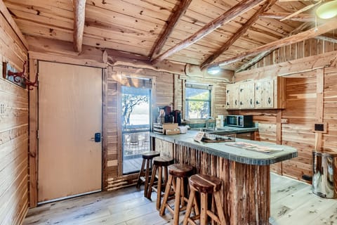 Kitchenette area with coffee bar. 