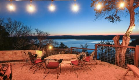 Large outdoor fire pit with incredible Lake Travis and Texas Hill Country views.