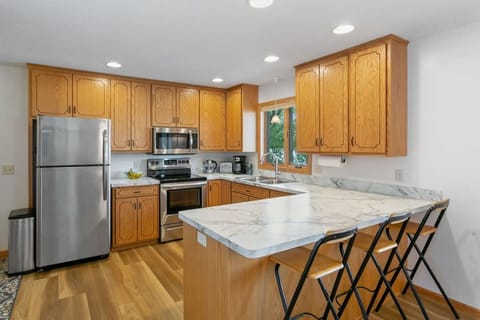 Updated kitchen with new appliances and counter tops.