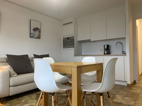 Furniture, Table, Cabinetry, Wood, Chair, Interior Design, Flooring, Countertop, Floor, Beige