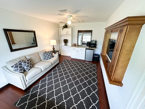 Built in kitchenette with mini fridge, toaster oven, microwave and drip coffee.