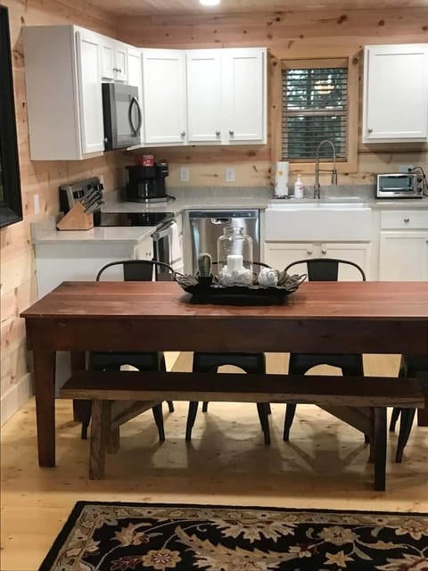 Kitchen and hand made bench around our restored farm house table.