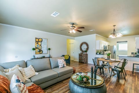 Living Room with 70 inch TV and Fireplace
