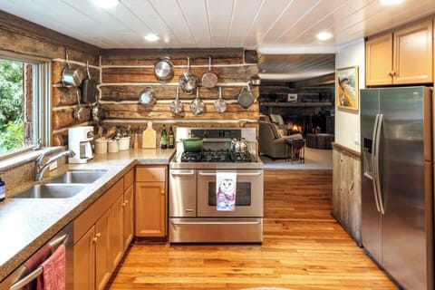 Kitchen looking into the cozy downstairs living room.