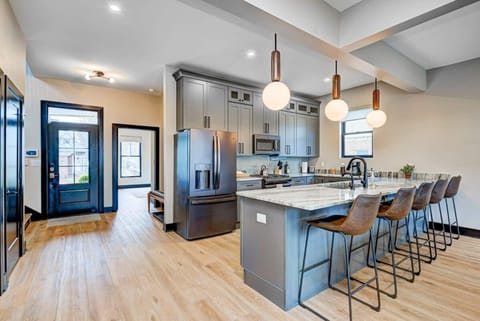 In addition to a full dining room, there is also seating for 5 at the kitchen peninsula.