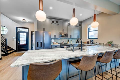 If you decide to make a meal in the home, there are all the appliances you will need. Appliances include a french door refrigerator, a gas oven range, a microwave vent hood, dishwasher, garbage disposal.