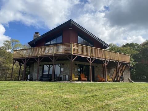 The spacious lodge has a wrap around deck and a lower level patio.