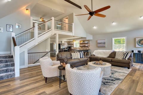 Spacious open living areas and stairs to upper and lower levels.