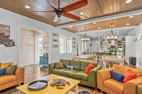 Bright and breezy open-concept living with colorful coastal decor—perfect for entertaining and unwinding.
