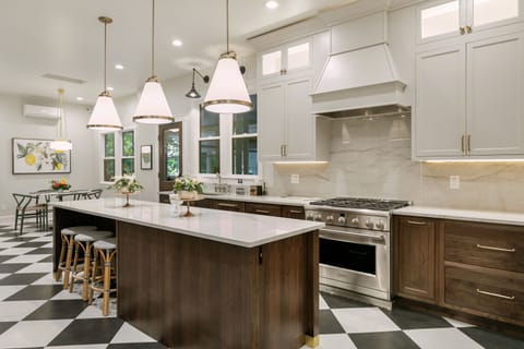 Gourmet cooking in award winning kitchen with high end appliances