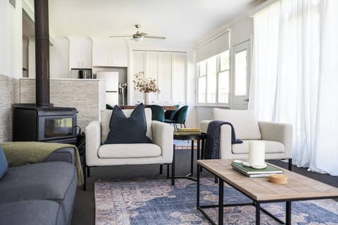 Get cozy on one of the plush lounges as you light up the wood-burning fireplace.