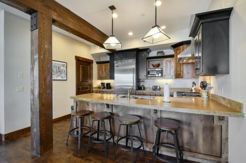 Kitchen with breakfast bar.