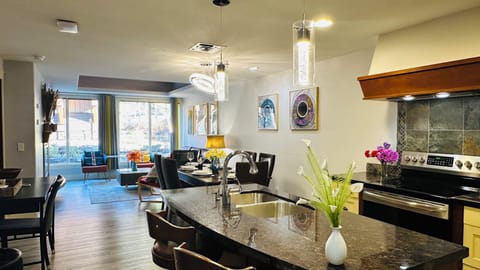 Fully equipped kitchen with stainless steel appliances and granite countertops
