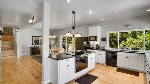 Kitchen island with electric stove and oven