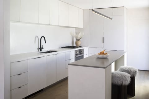 Open kitchen with breakfast bar island 