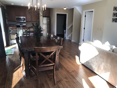 Large Pottery Barn dining table with seating for up to 8