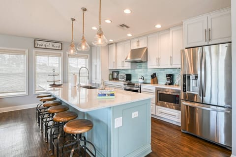 Imagine your family cooking up some favorites in this beautiful, updated kitchen.