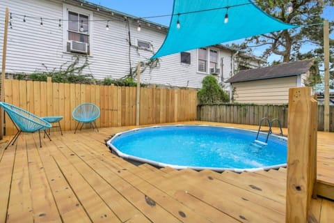Cool off in the sparkling above-ground pool — your own backyard oasis.
