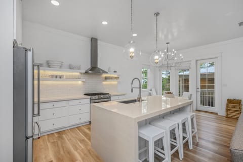 Gourmet stocked kitchen for cooking and dining
