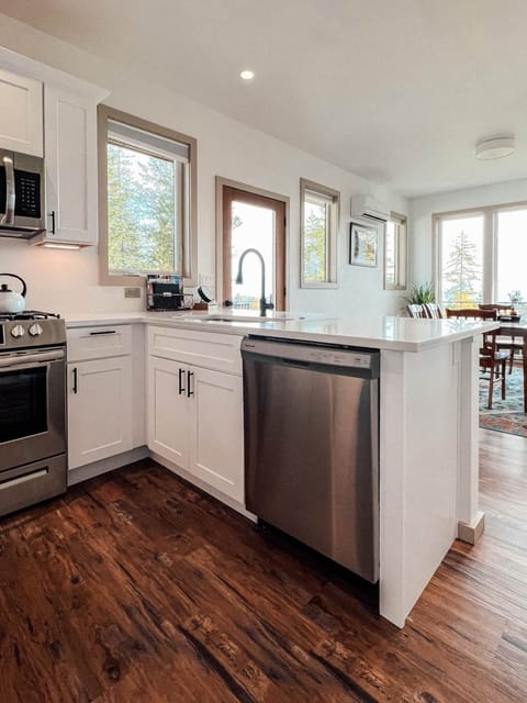 Even the kitchen has views with an open concept design to the dining room