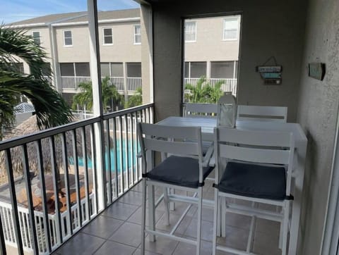 Patio overlooks the condo pool!