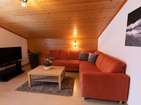 Furniture, Property, Couch, Comfort, Wood, Orange, Interior Design, Living Room, Floor, Houseplant