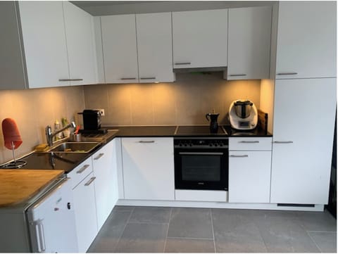 Kitchen area with all modern appliances.