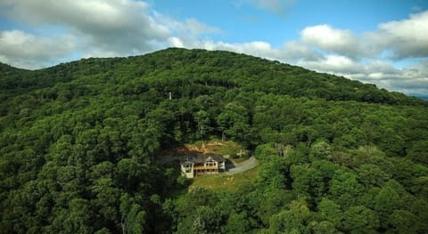 Tucked into the treetops above Banner Elk, Boulder Sky At River Run offers true mountain seclusion on a grand scale.