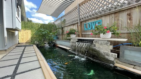 Private koi pond for your viewing pleasure w/ the sounds of cascading water.