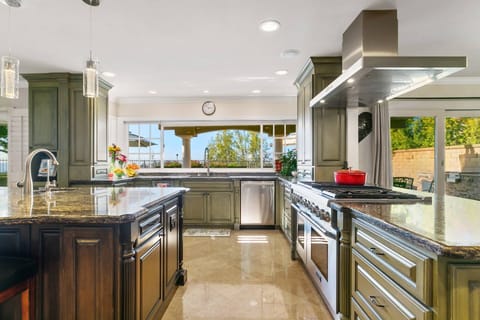 Kitchen with gas range and upgraded appliances