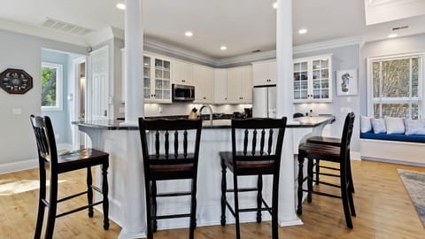 Raise a glass while watching the cook