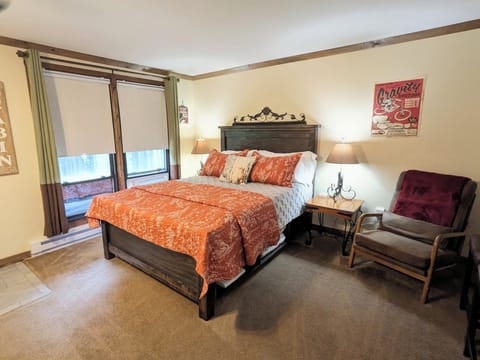 Bedroom area with queen-sized bed