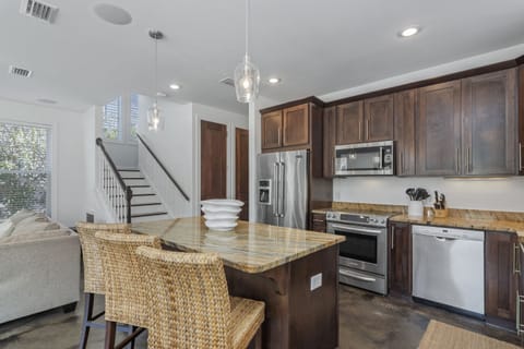 Stocked gourmet kitchen